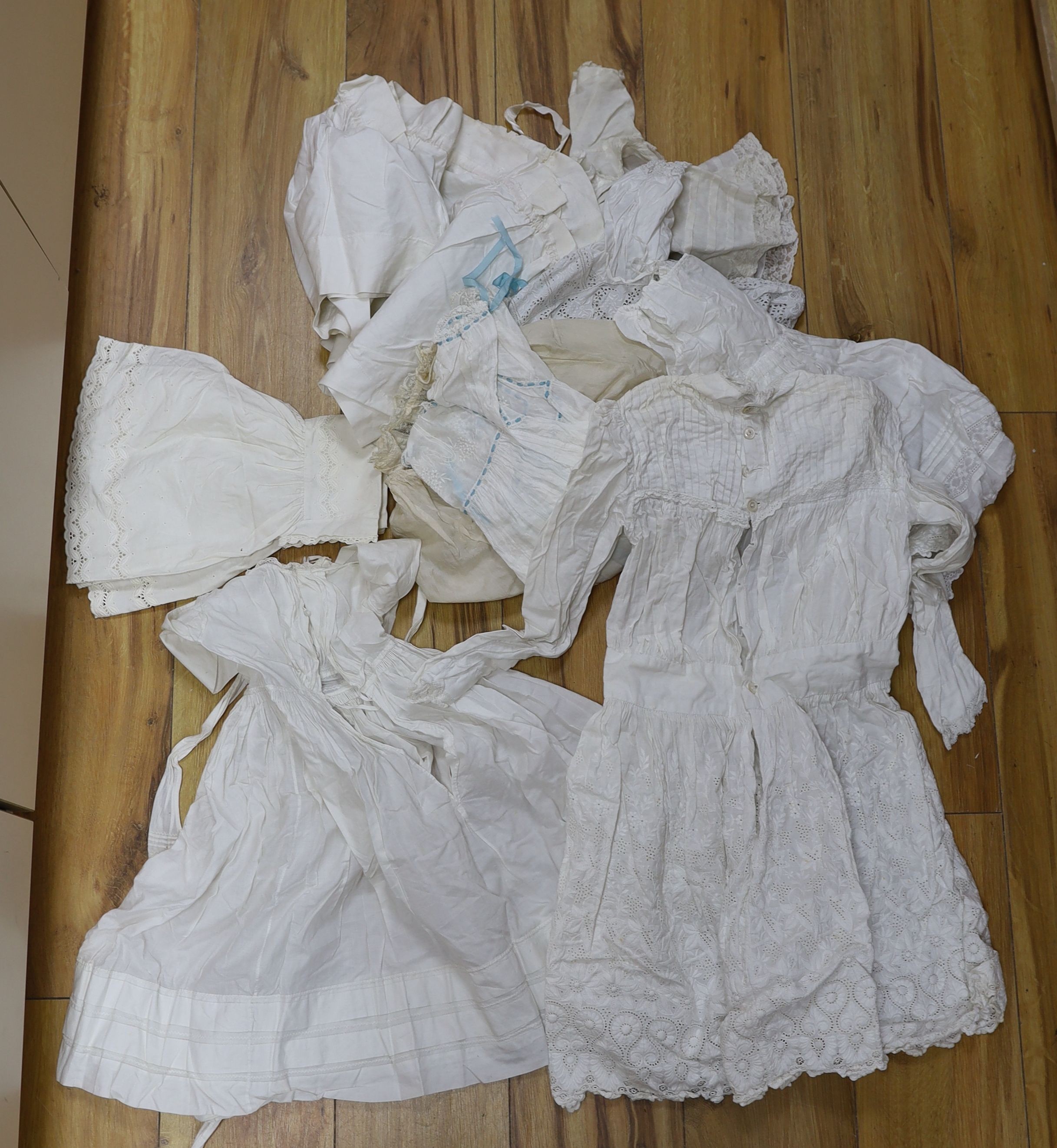 A collection of whiteworked baby gowns